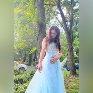 only warn once, light blue sparkling gown princess style. the dress is a size 0.
